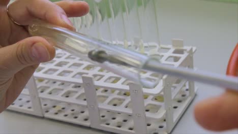 injecting sample into test tube