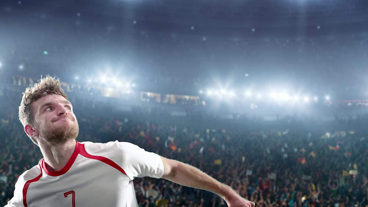 un jugador de fútbol feliz en un estadio de fútbol