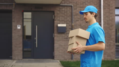 delivery person with packages at a home