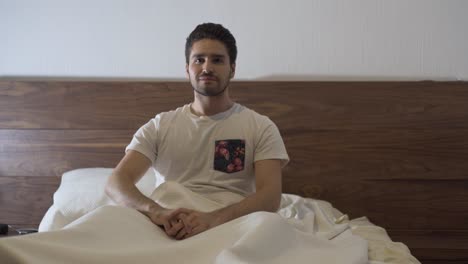 young man waking up ready to take his day head on