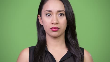 young beautiful asian businesswoman covering ears as three wise monkeys concept