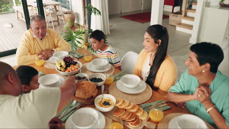 Family,-dinner-table-and-father-help-kid