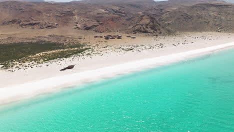 unspoiled with white sand shore at shoab beach near qalansiyah in socotra island, yemen