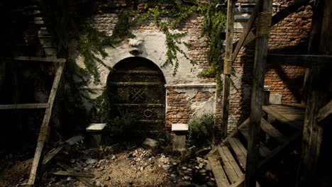 abandoned brick building with ivy and scaffolding