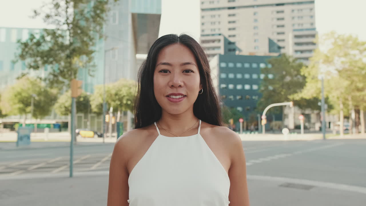 Portrait of a woman in a city