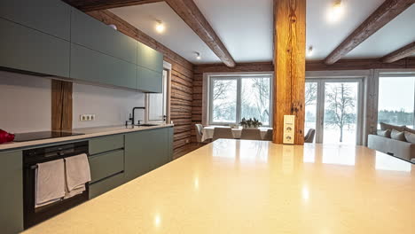 smooth shot of a minimalistic, clean and beautiful kitchen with panorama windows