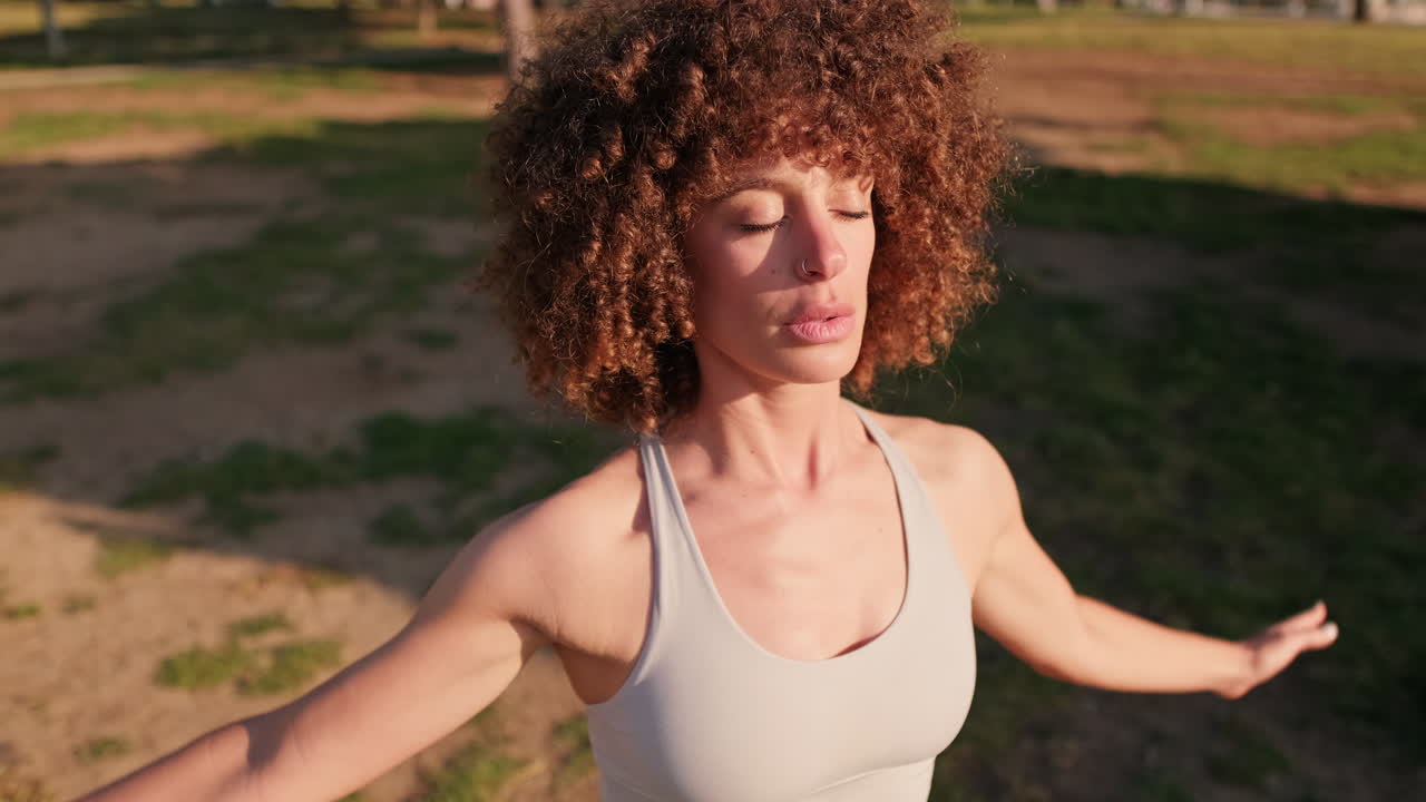 Fitness Woman Stretching in Park at Sunset