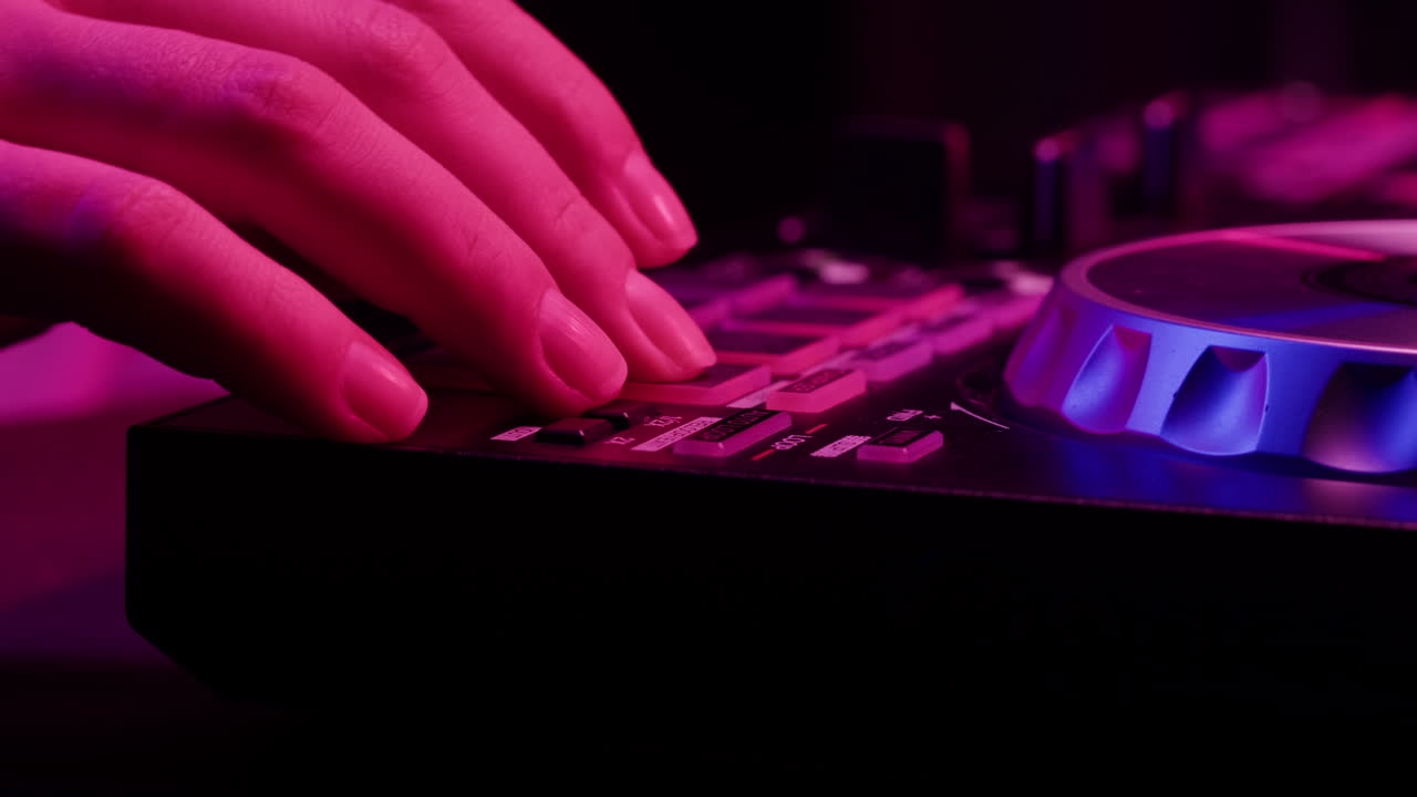 Vibrant DJ Mix Performance Closeup view of hands and equipment during a live music performance, city event, dj set in music techno club