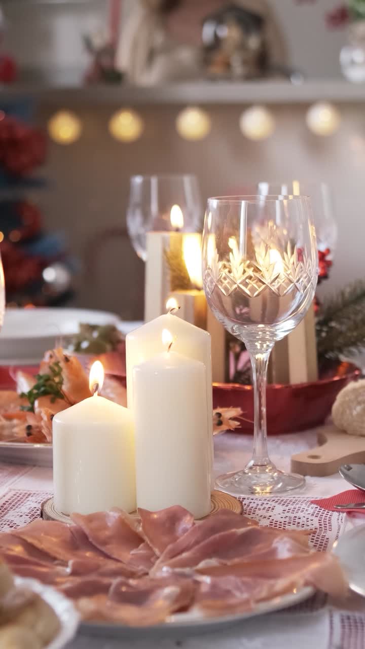 Slow motion video with the focus on Christmas decorations on the table at home