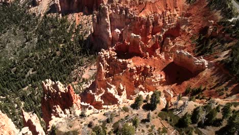 Aerial-drone-footage-captures-the-expansive,-cinematic-perspective-of-Bryce-National-Park's-striking-red-rock-formations-and-the-landscape-that-surrounds-them