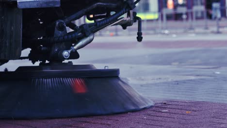 close-up of a street sweeper in movement