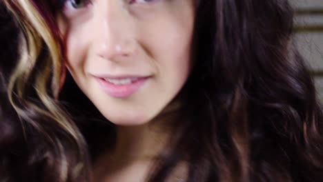 young brunette woman looks in camera