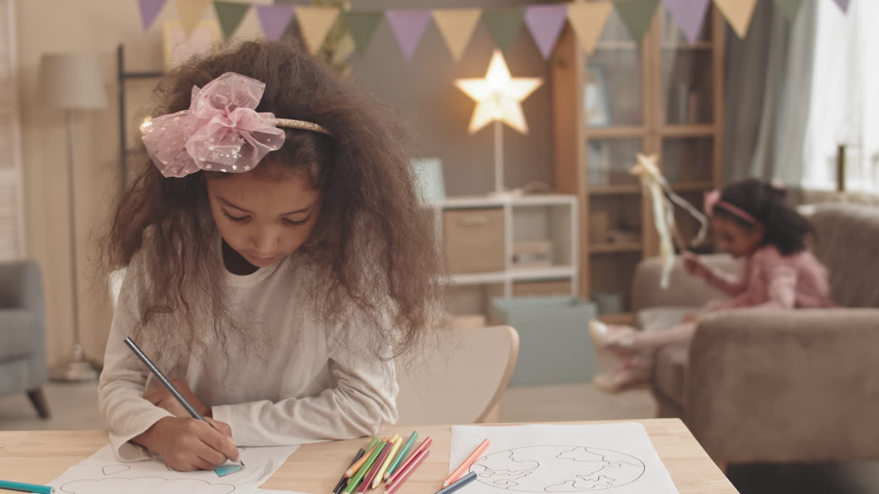 Sister Joining Girl Drawing at Home
