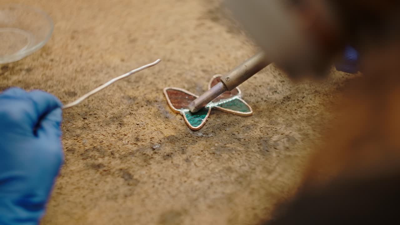 Soldering a stained glass butterfly