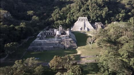 an aerial view over palenque mayan pyramids in mexico 2