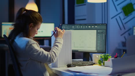 industrial woman employee studying blueprint idea