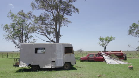 sunny day, abandoned cars on roadside near saladas, argentina