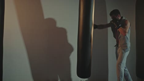 man boxing training session