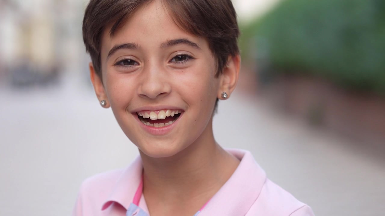 Pretty head and face shot of little girl with straight hair
