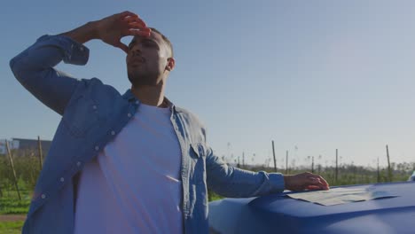 young man on a road trip in pick-up truck