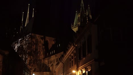 night shot of famous cathedral next to domplatz in erfurt old town