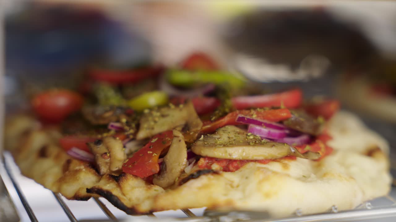 Pizza Loaded With A Variety Of Veggie Toppings. Close-up Shot