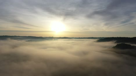 misty sunrise over mountains