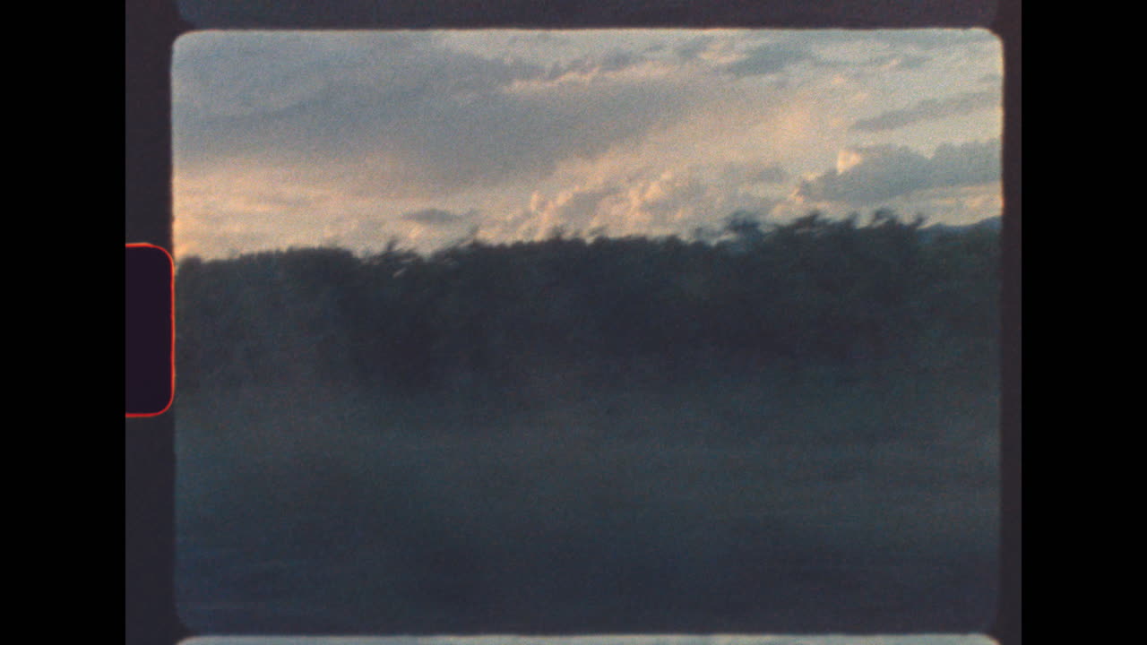 Driving past vineyard in Provence countryside during sunset on 8mm film
