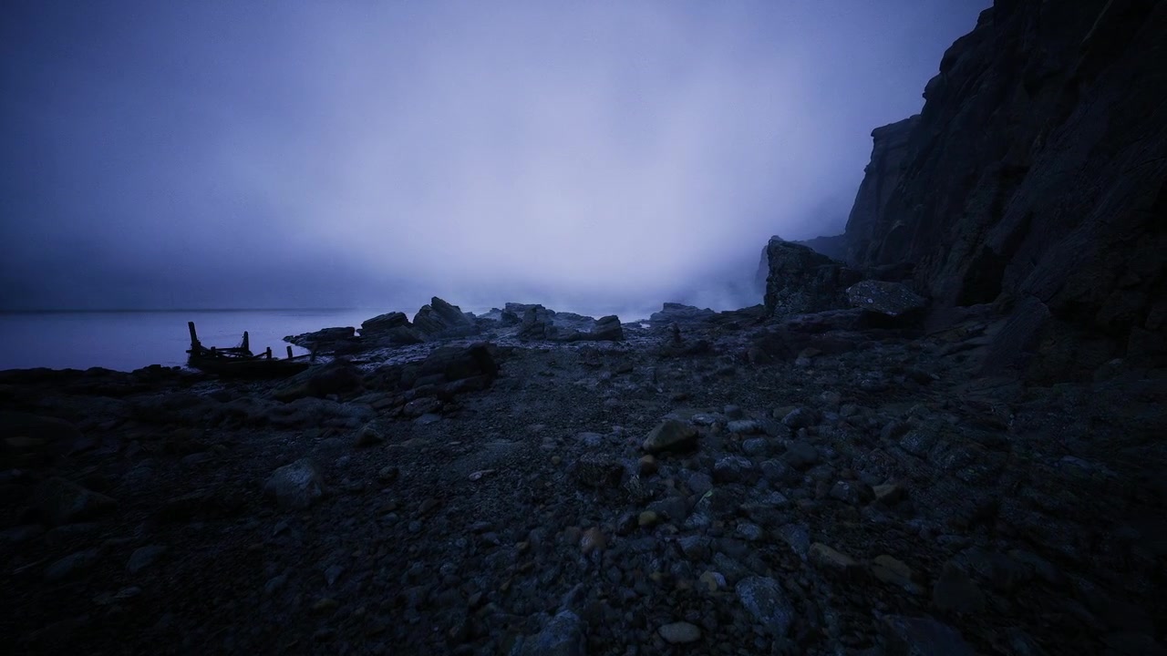 Peaceful coast at twilight with hues of purple illuminating shoreline landscape