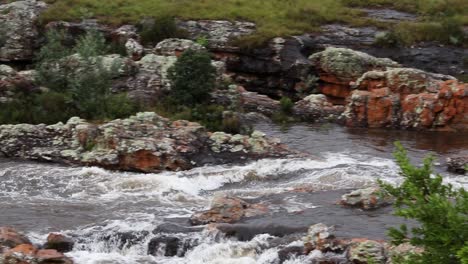 pan shot of water rushing towards the lisbon falls