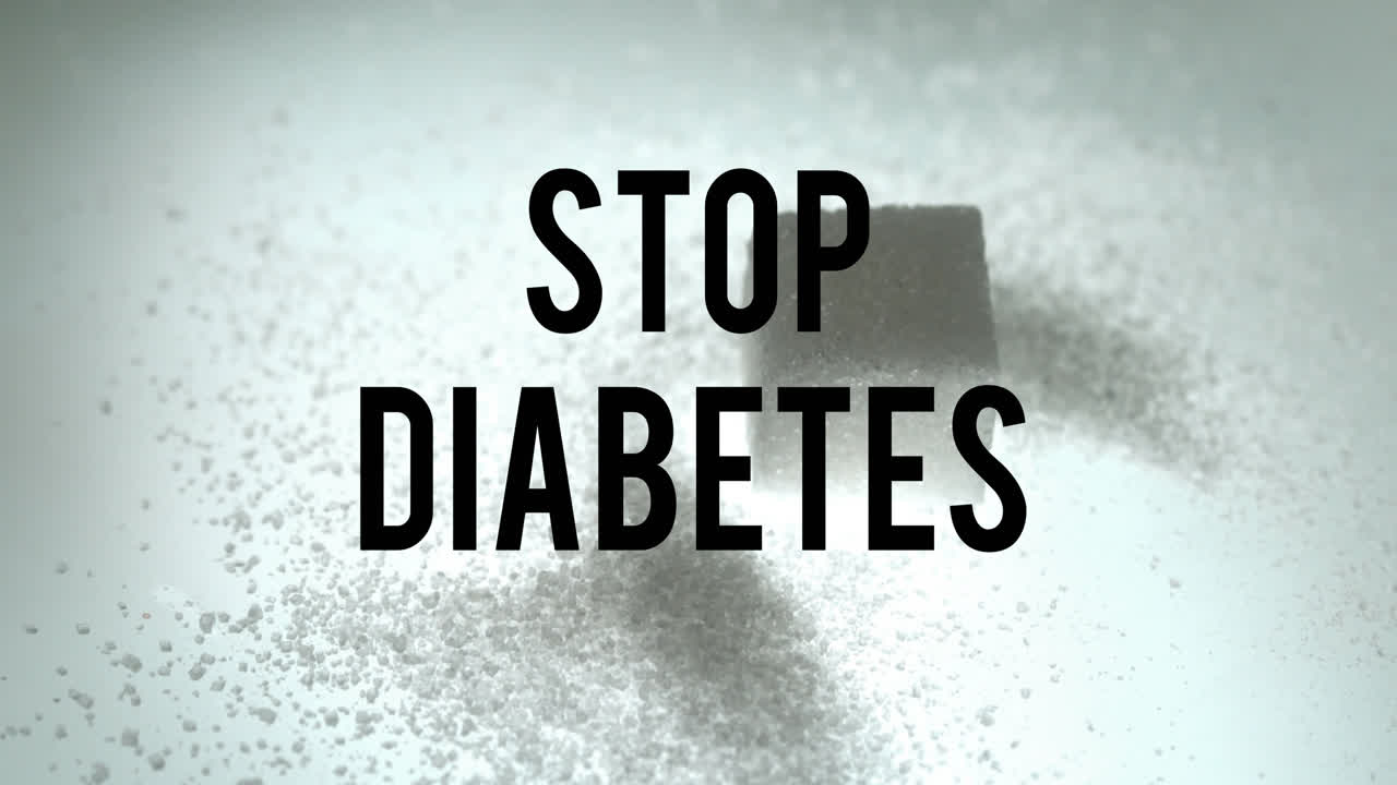 Animation af tekst "stop diabetes" over en sukkerknald