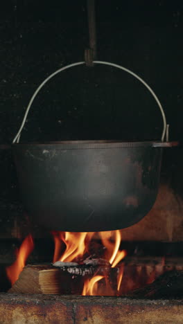 pot cooking on a campfire