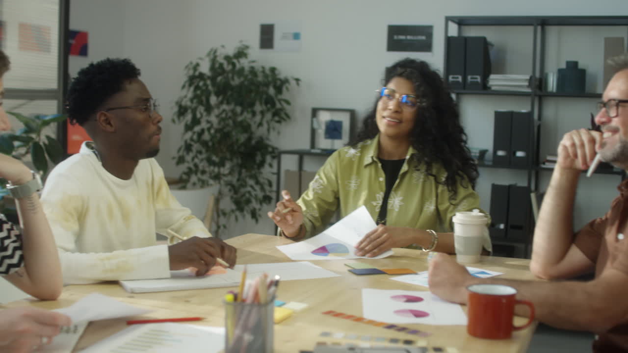 Female Team Leader Holding Meeting