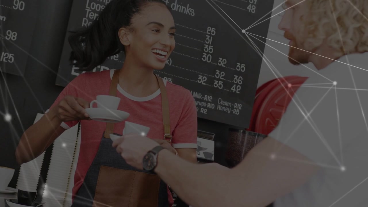 Camera panning revealing barista handing cups to customer for service at cafe with network overlay