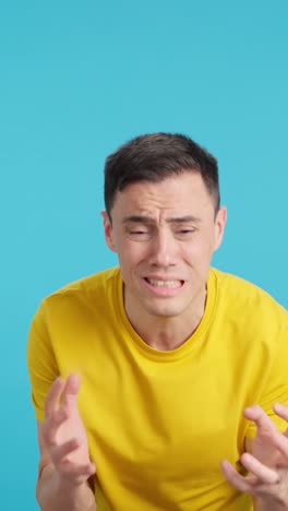 man expressing distress and frustration