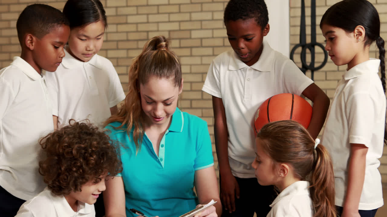 Pupils and teacher during sports lesson