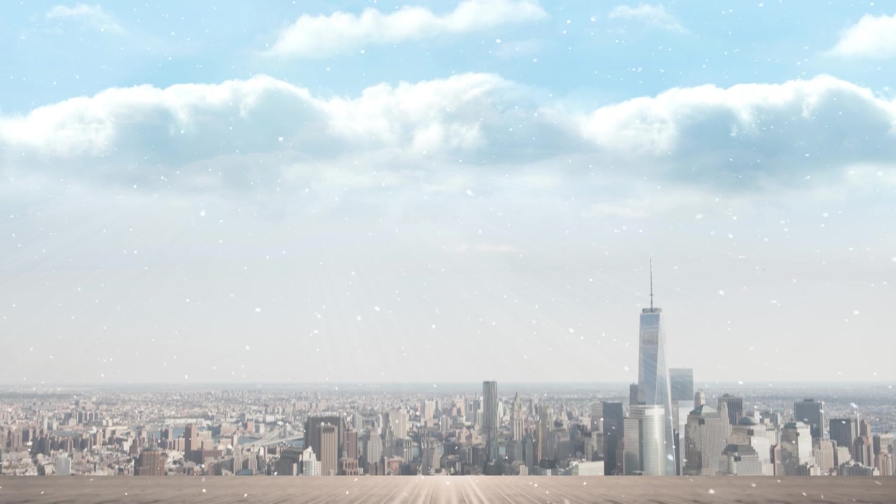 Animation of snow falling over cityscape at christmas