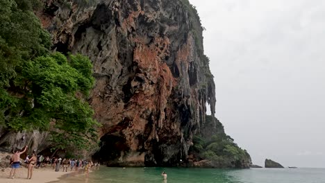 tourists enjoy a picturesque beach setting