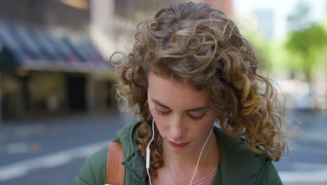 young woman walking in city