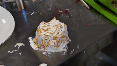 cooking creme brulee with kitchen torch