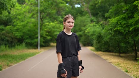 teenager rollerblading in a park