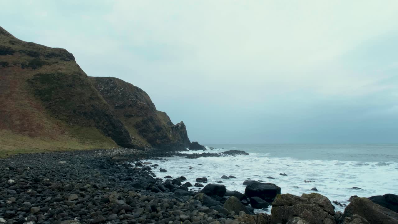 Coastal landscape bathed in cold air and soft, diffused light in Ireland
