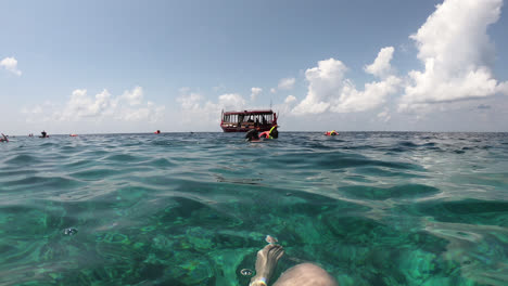 snorkeling in ocean sea at maldives