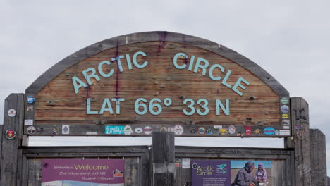 arctic circle sign on dempster highway, yukon, canada - close up