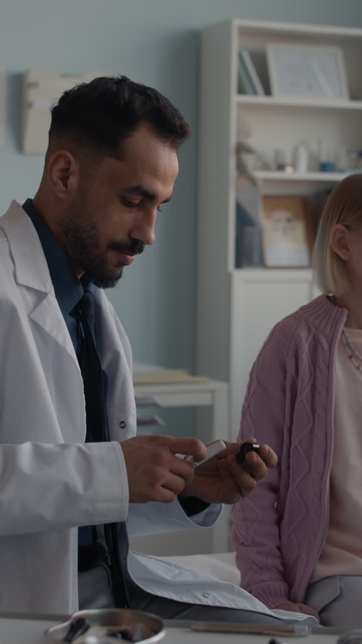 Medical examination with otoscope