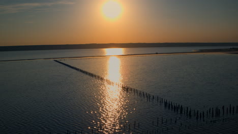 Drone-sea-coastline-at-morning-sunrise.-Nature-background.-Saline-water-surface