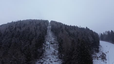 This is a large ski area that prepares Cortina 2026 in Italy. The locations are captured with a drone that shows the beauty of winter sports that combine blue sky, white snow and ski friends