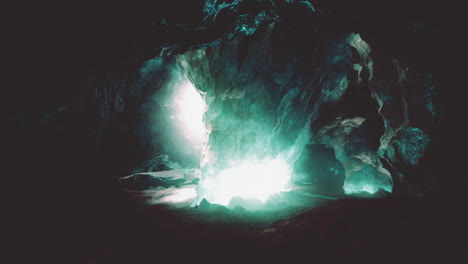 entrance of an ice cave inside glacier in southern iceland