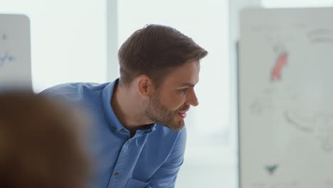 businessman scolding colleagues office. angry boss discussing employees