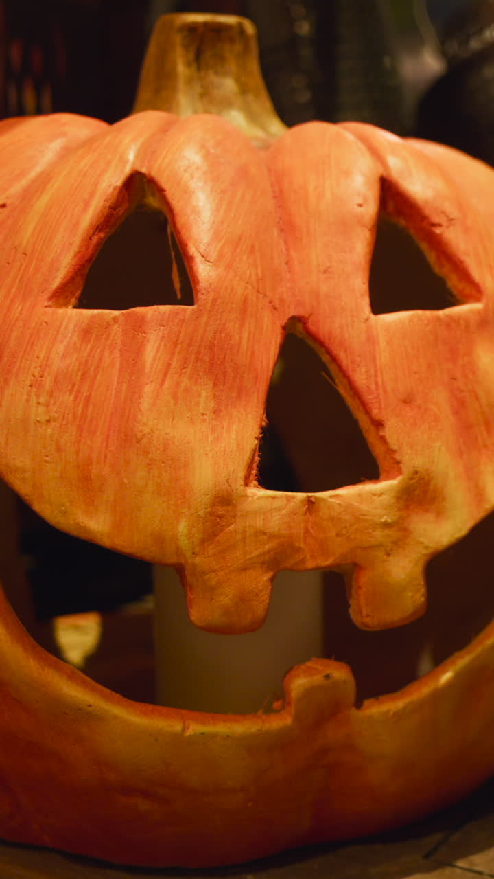 Halloween decorations in the Tivoli Gardens amusement park in Copenhagen, Denmark at night. Vertical